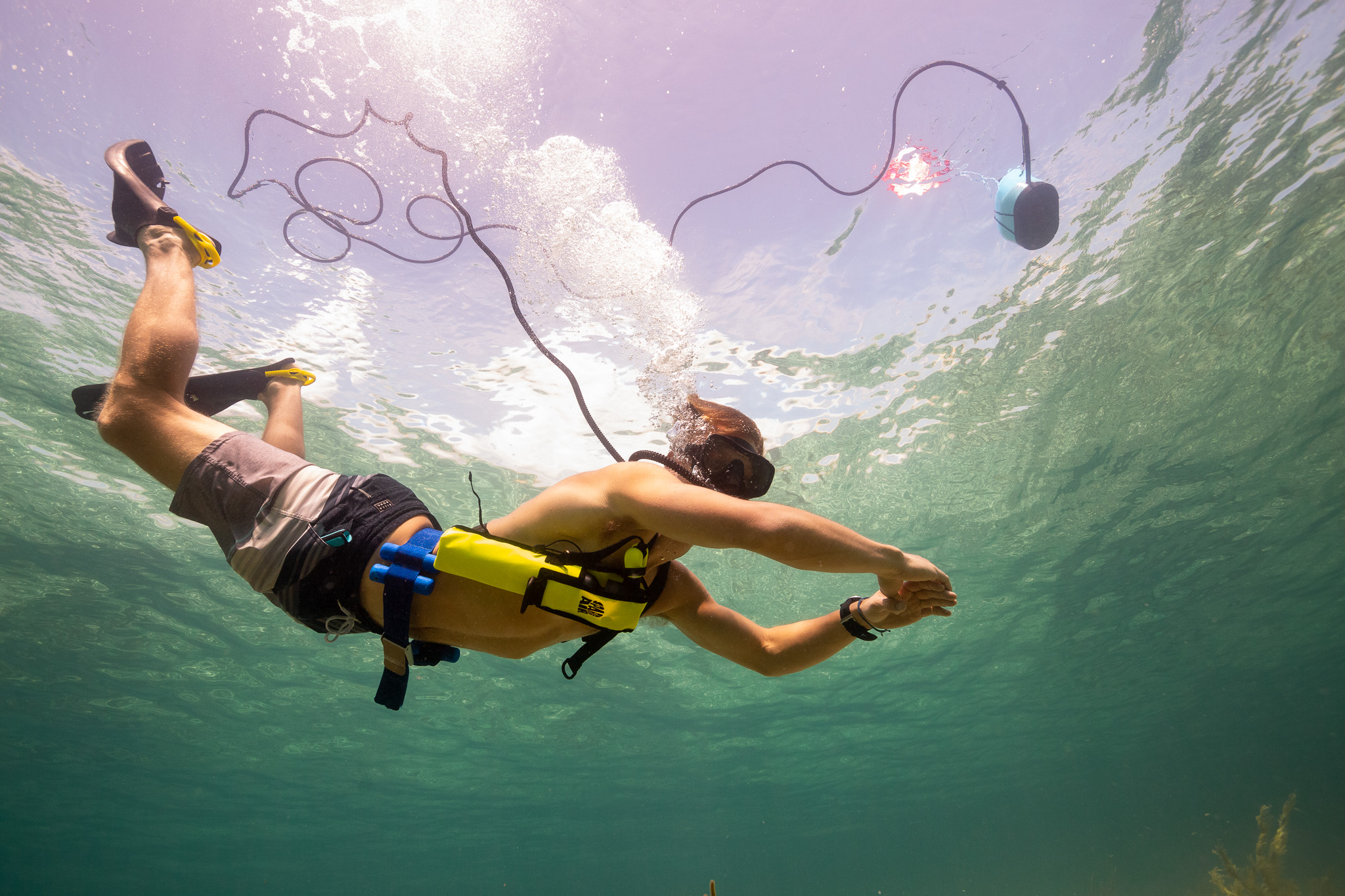Diver exploring underwater with a BLU3 surface-supplied dive system